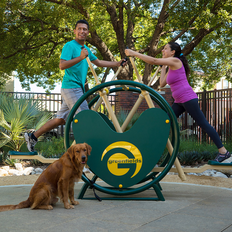 couple exercising at park