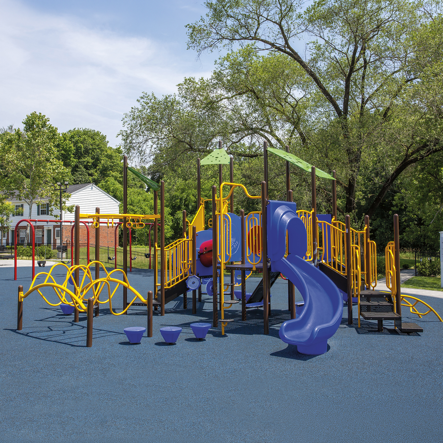 Image of a Henderson FIT Playground with curved slides